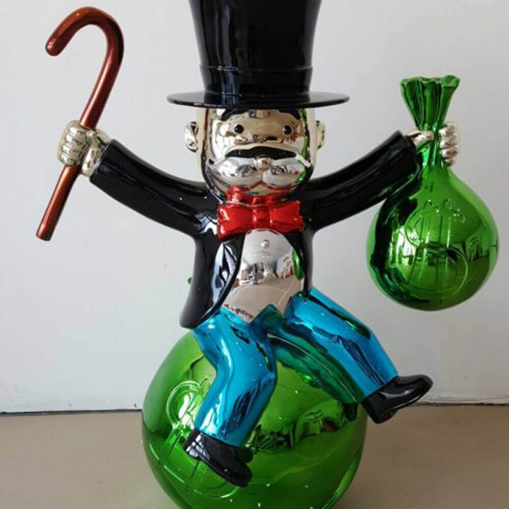 Fiberglass Monopoly sculpture Sitting on Money Bags