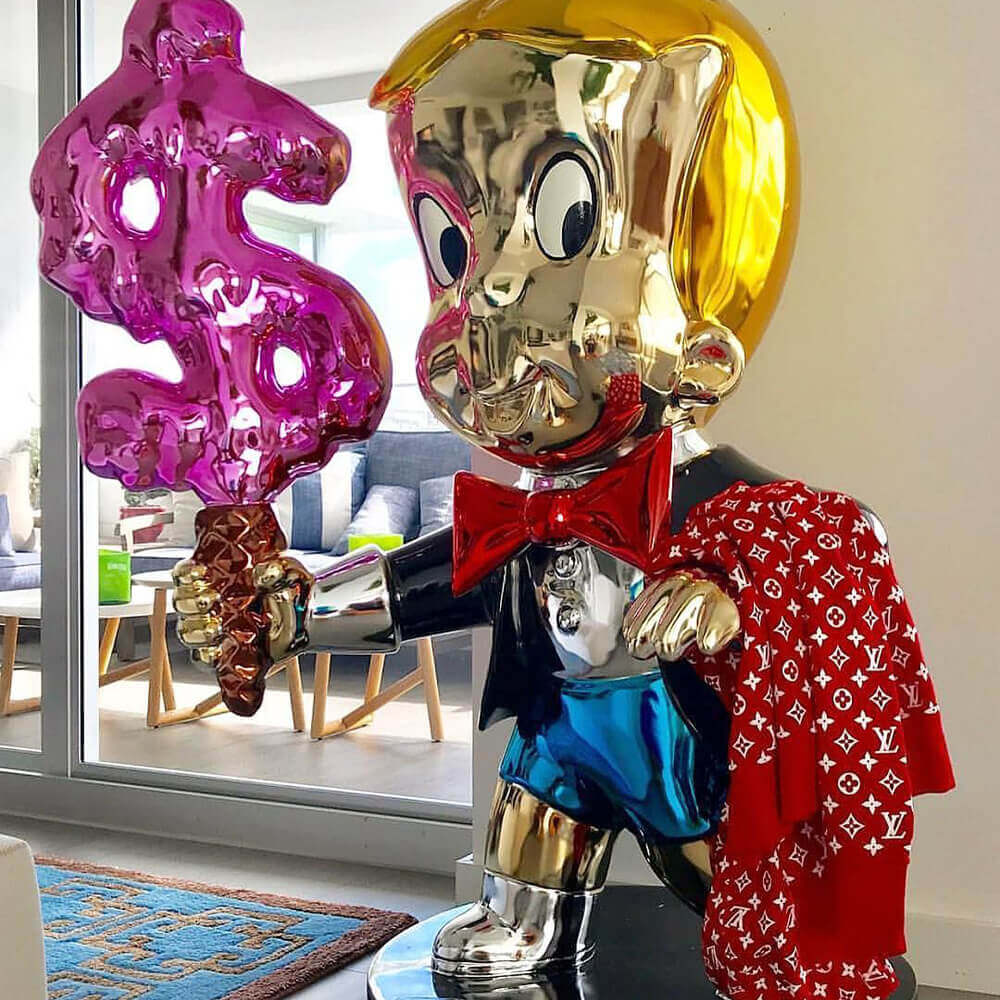 alec monopoly richie rich sculpture