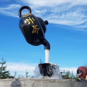 floating teapot fountain sculpture