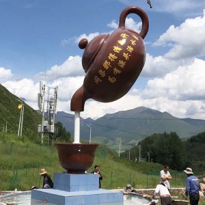 Floating teapot fountain sculpture