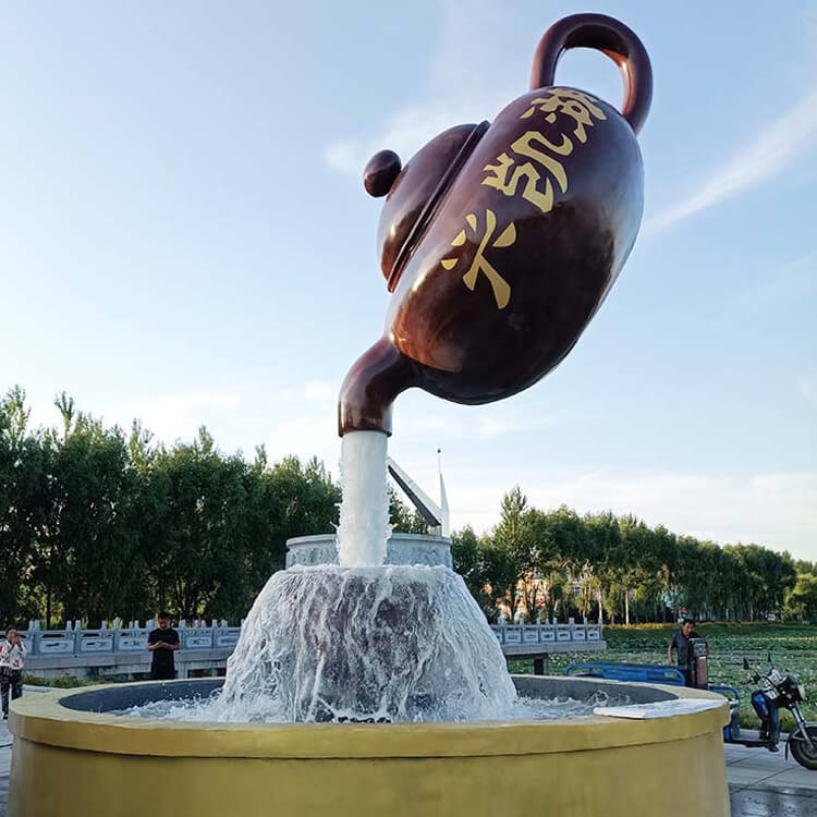 Floating teapot fountain sculpture