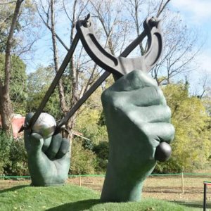 Bronze Big Hand Holding Slingshot Metal Sculpture For Sale