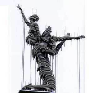 Stainless Steel Sliced Double Dance Sculpture For Sale