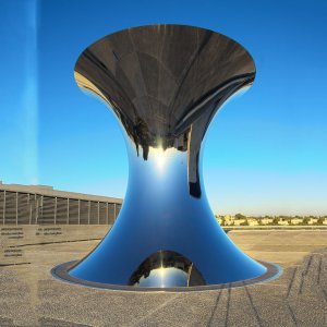 Stainless Steel Sculpture Turning The World Upside Down For Sale