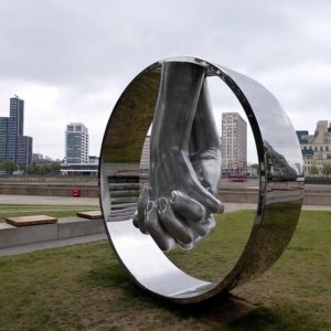Stainless Steel Holding Hands Sculpture For Sale