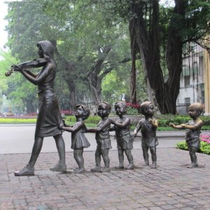 Teacher And Children Bronze Group Sculpture For Sale