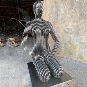 Stainless Steel Kneeling Woman Disappearing Sculpture For Sale