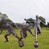 Bronze Child Playing Soccer Statue For Sale