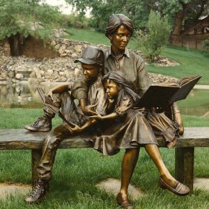 Bronze Teacher And Children Reading Sculpture For Sale