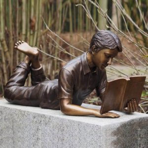 Bronze Lying Boy Reading Statues For Sale