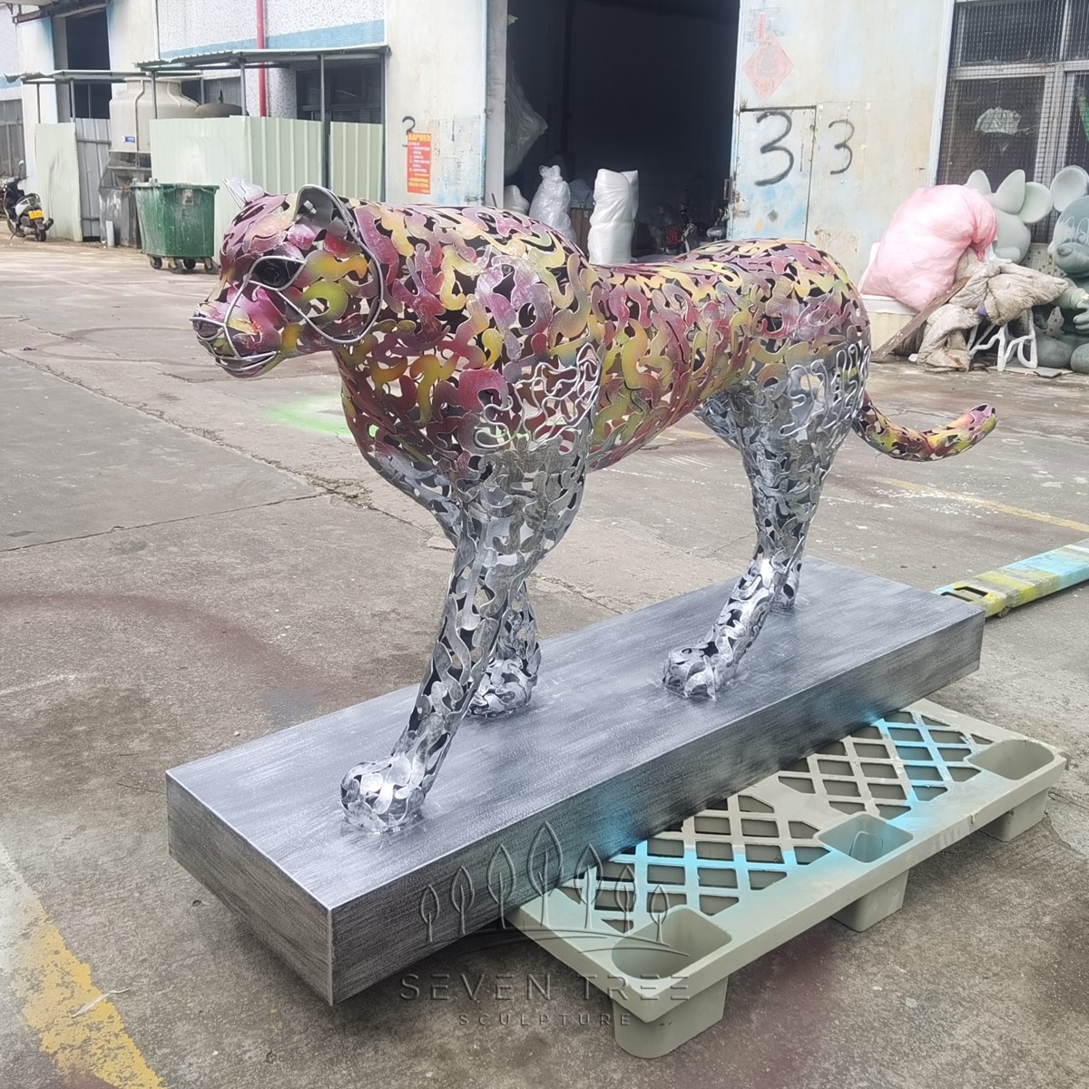 stainless steel leopard sculpture hotel entrance